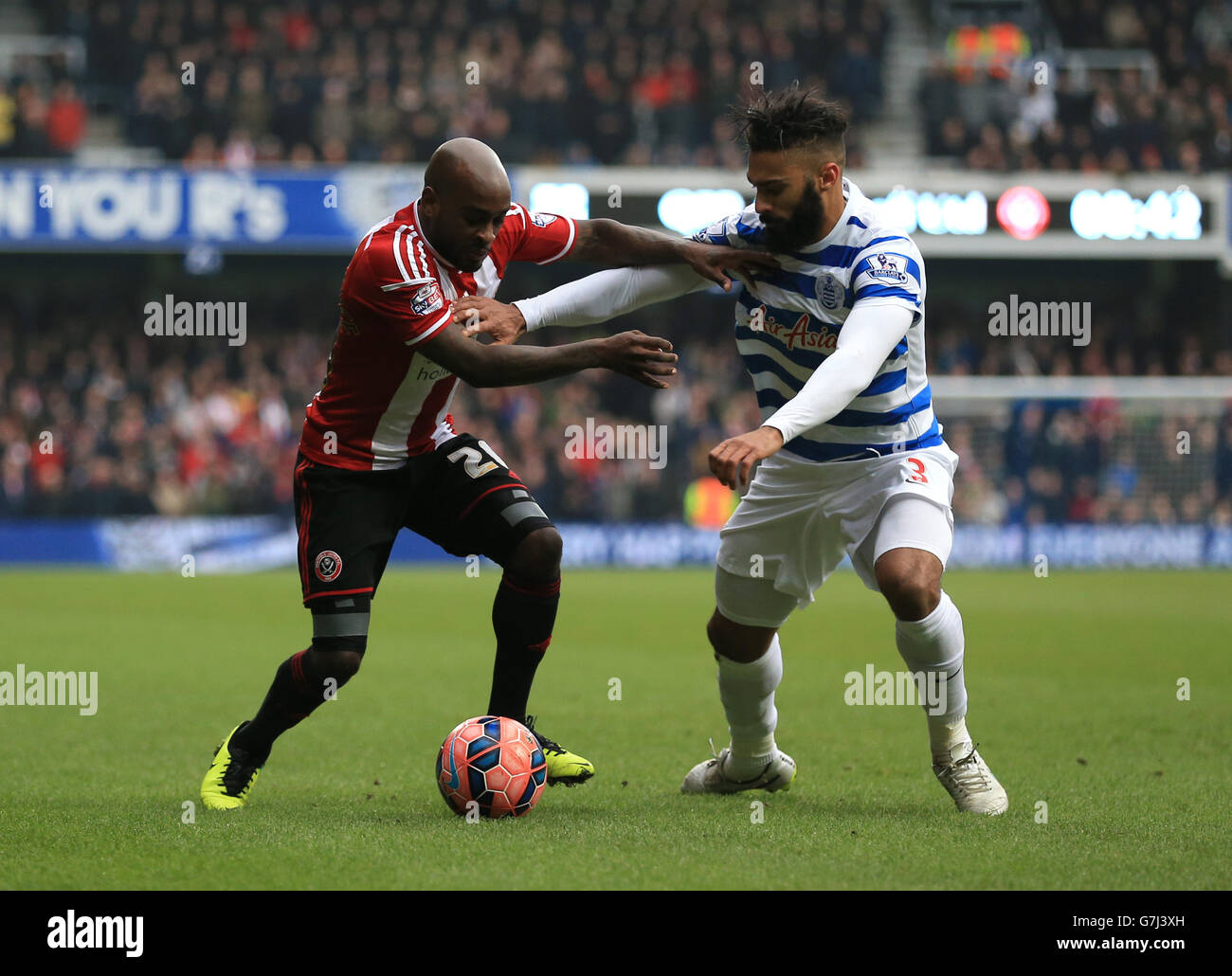 Queens Park Rangers' Armand Traore (right) and Sheffield United's Jamal ...