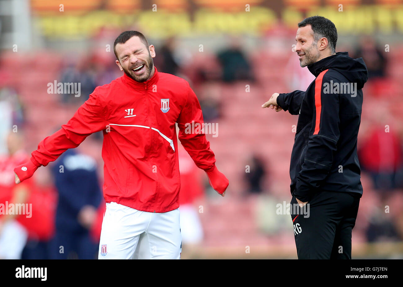 Manchester United Assistant Manager Ryan Giggs and Stoke City's Phillip Bardsley Stock Photo