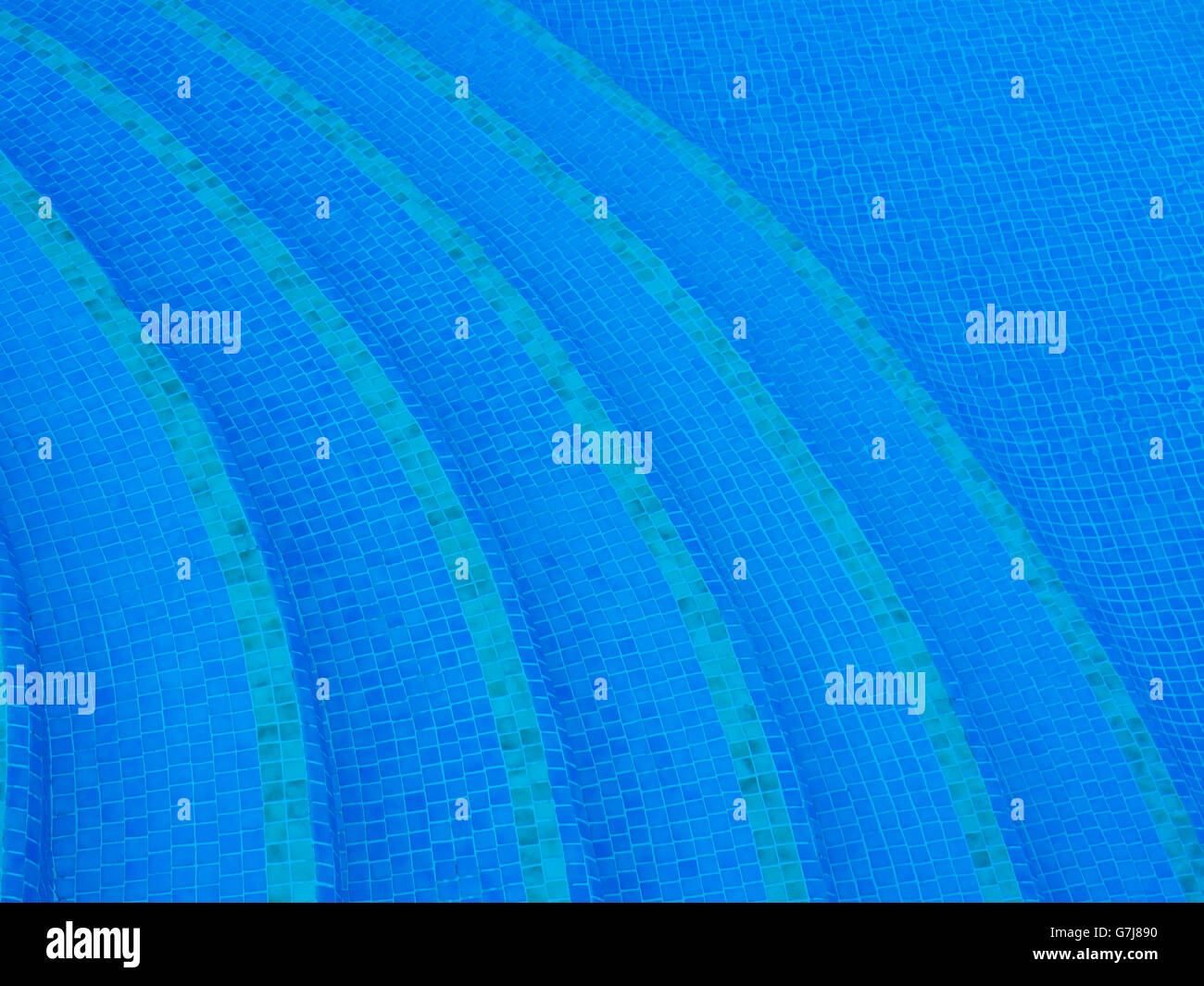 Abstract swimming pool image blue water, tiles and curved stairs Stock ...