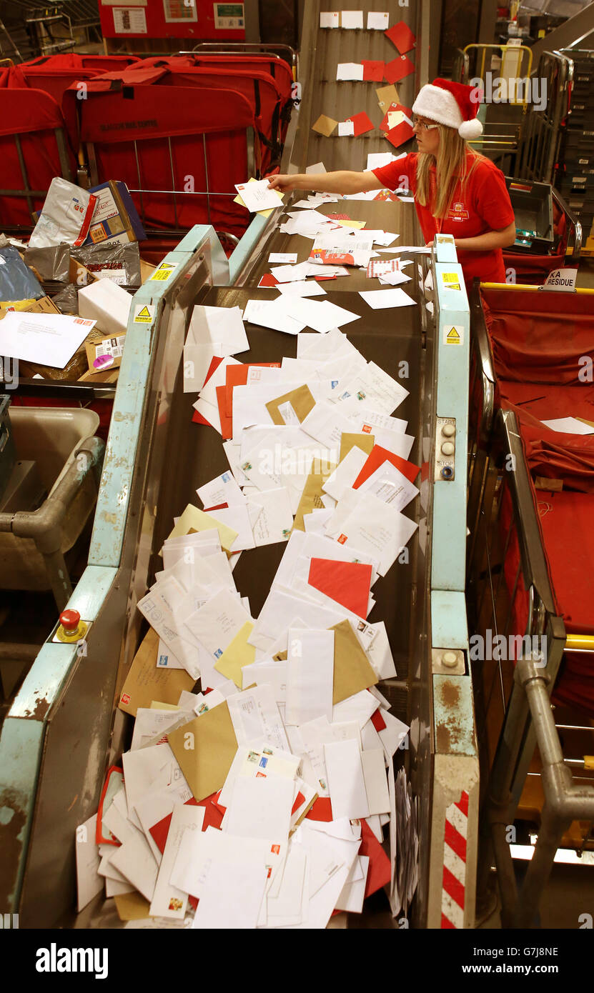 Royal Mail Employee Samantha Addison sorts parcels at Royal Mail's