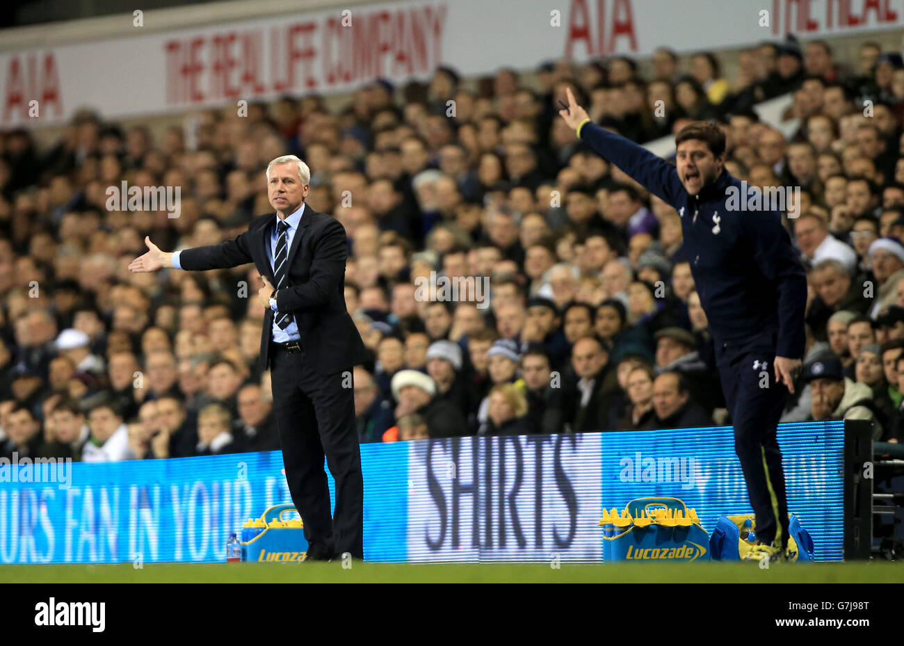 Newcastle United manager Alan Pardew (left) and Tottenham Hotspur manager Mauricio Pochettino (right) on the touchline during the Capital One Cup Quarter Final match at White Hart Lane, London. PRESS ASSOCIATION Photo. Picture date: Wednesday December 17, 2014. See PA story SOCCER Tottenham. Photo credit should read: Nick Potts/PA Wire. RESTRICTIONS: Editorial use only. Maximum 45 images during a match. No video emulation or promotion as 'live'. No use in games, competitions, merchandise, betting or single club/player services. No use with unofficial audio, video, data, fixtures or Stock Photo