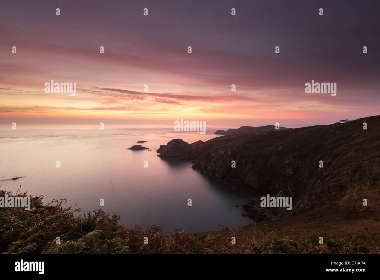 Sunset at Pwll Deri, Strumble Head, Pembrokeshire Coast National Park, Wales Stock Photo