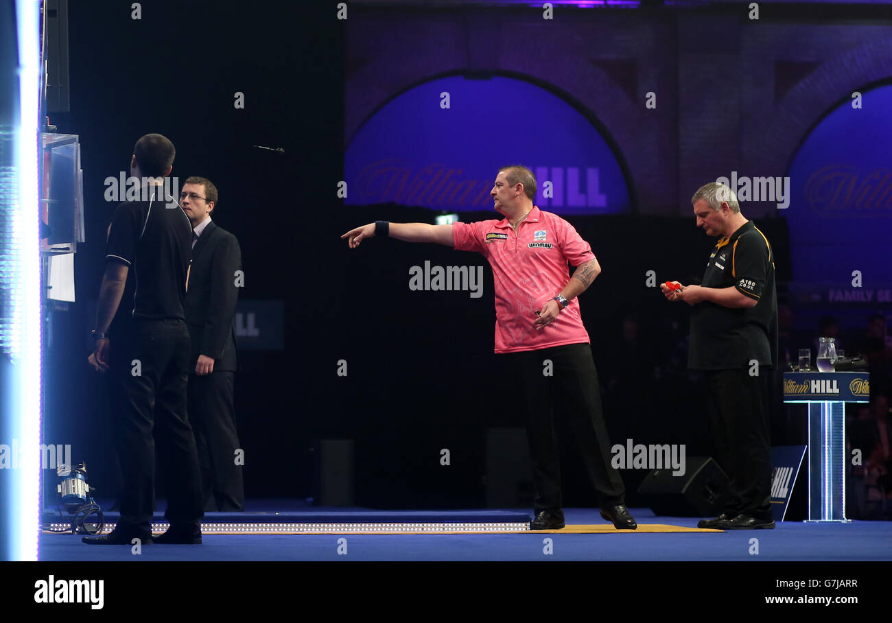 Dean Winstanley during his match against Wayne Jones during the William Hill World Darts Championship at Alexandra Palace, London. Stock Photo
