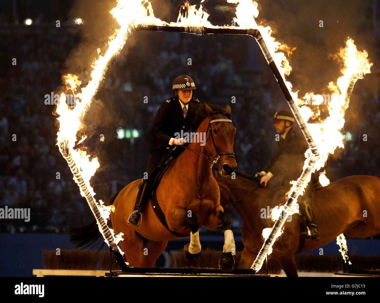 The Metropolitian Police Actviity Ride perform during day seven of the Olympia London International Horse Show at the Olympia Exhibition Centre, London. Stock Photo