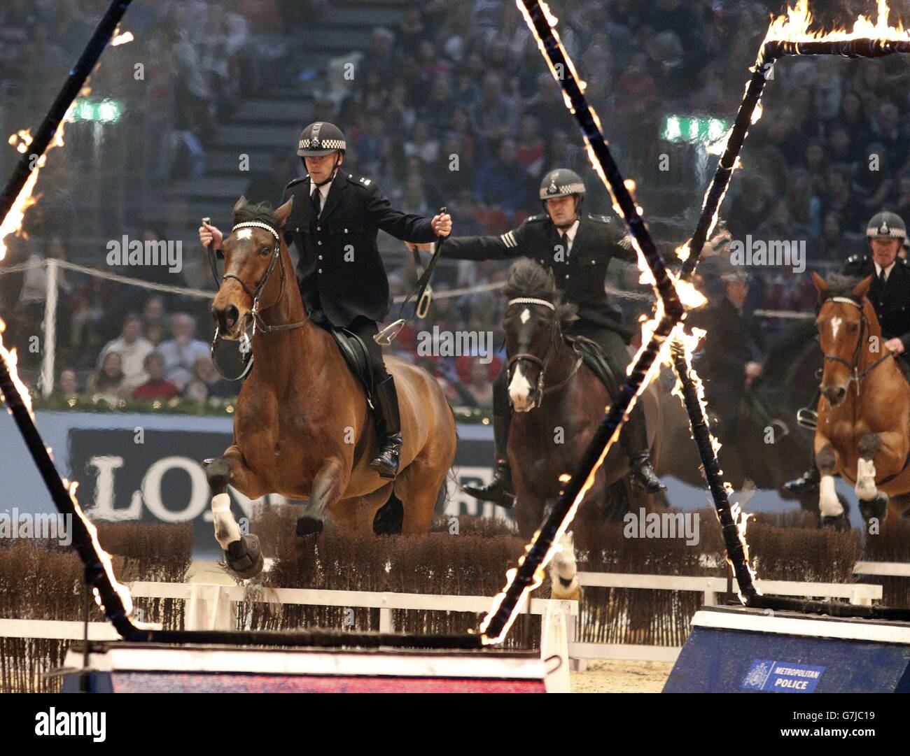 The Metropolitian Police Actviity Ride perform during day seven of the Olympia London International Horse Show at the Olympia Exhibition Centre, London. Stock Photo