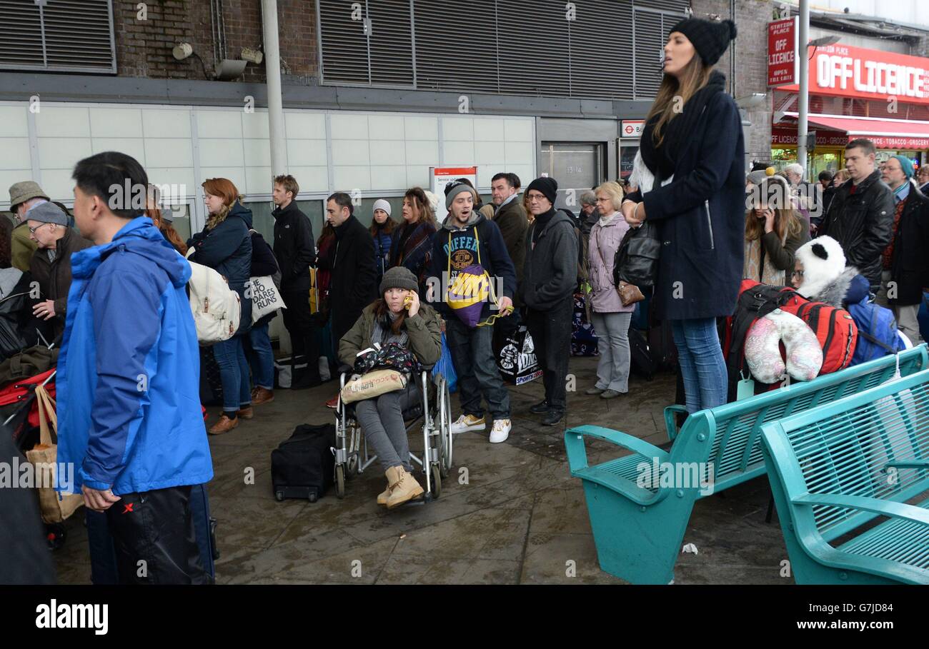 Travellers are locked out of Finsbury Park station, London, where they were directed to go as trains in and out of King's Cross have been cancelled because of overrunning Network Rail engineering works north of the station, with a reduced service tomorrow. Stock Photo