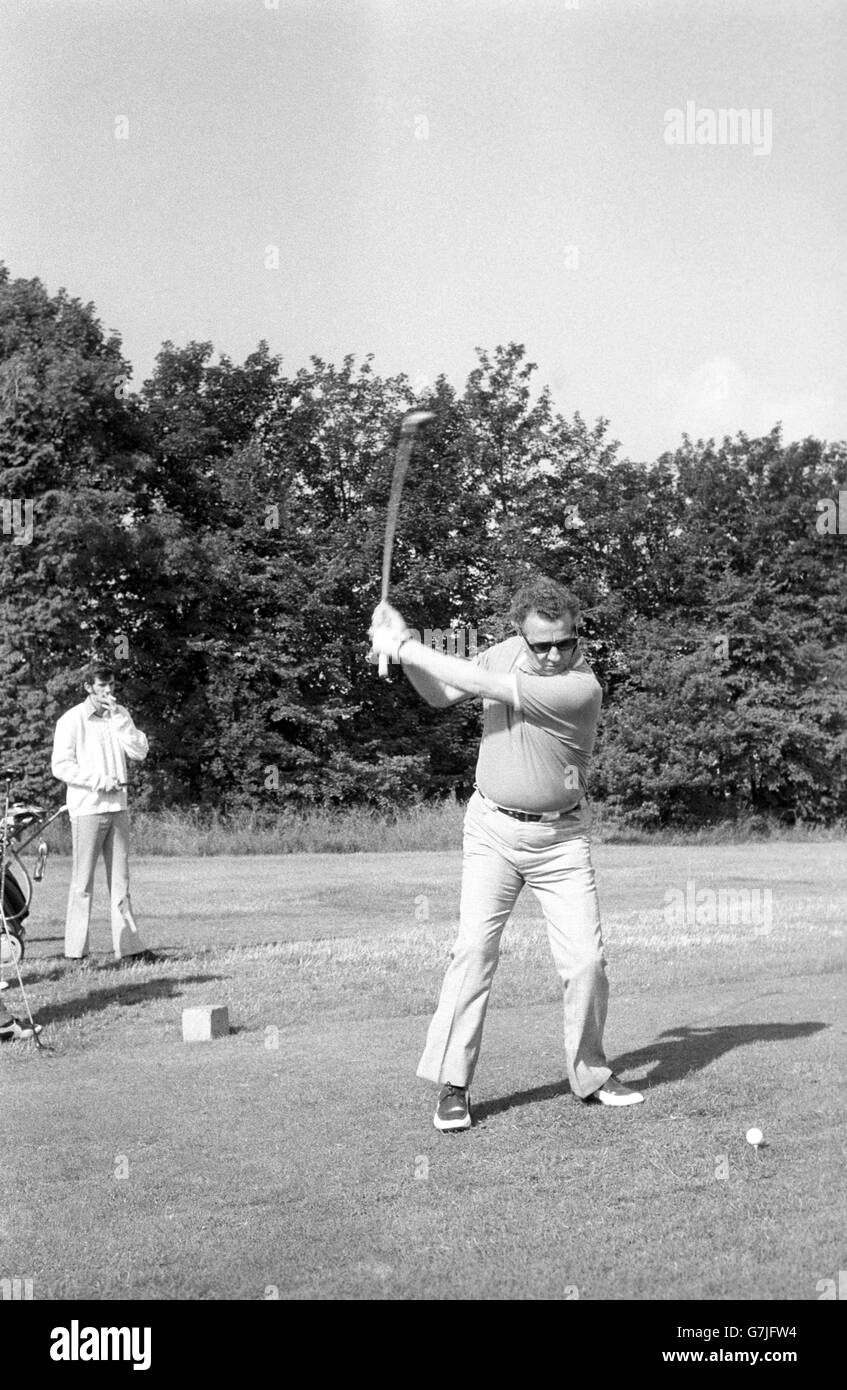 Blind golfer Gerry Brereton Tee's off at Cuddington, near Banstead. Stock Photo