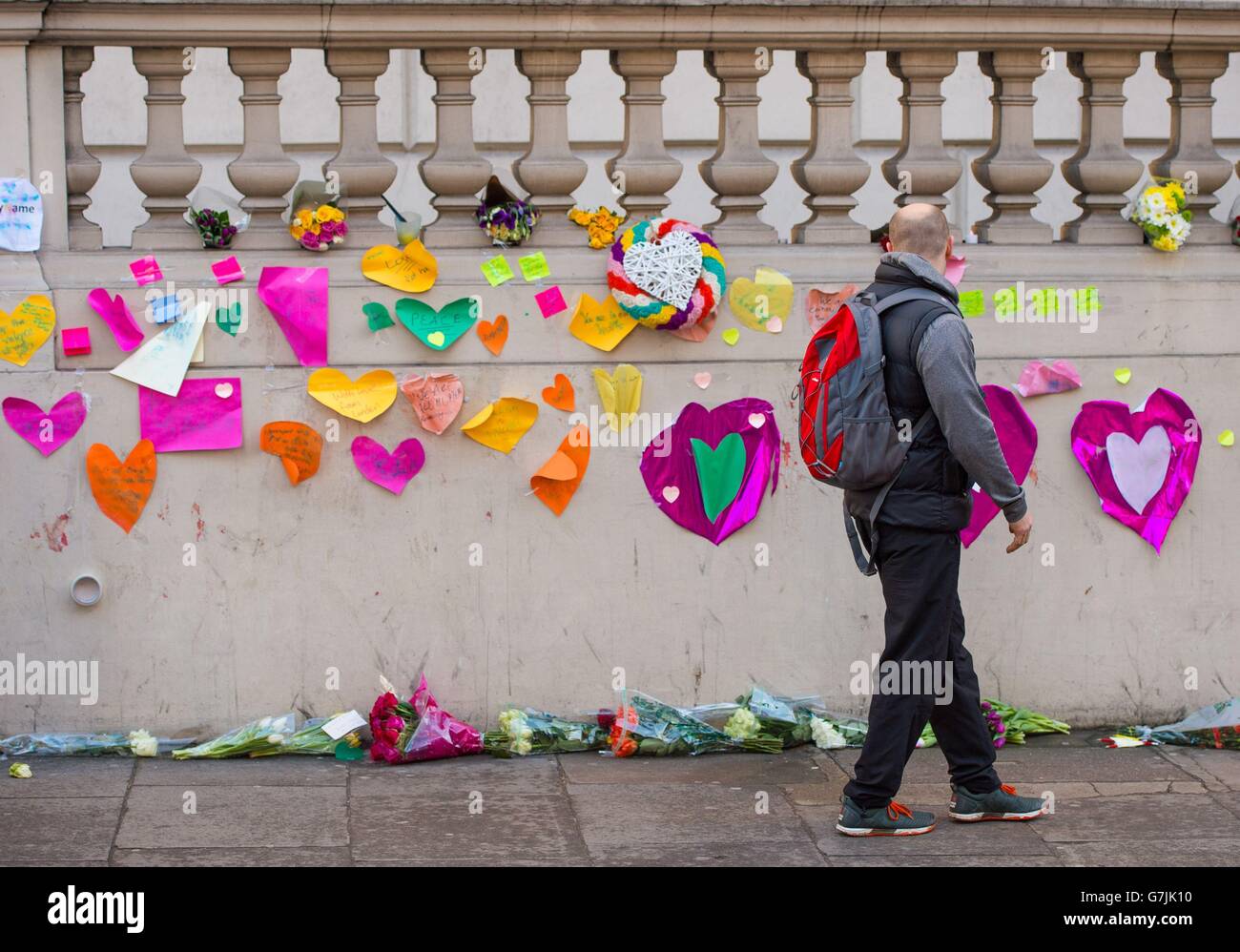 Tributes to the victims of the terrorist attack on French satirical magazine Charlie Hebdo, outside the French Embassy in Knightsbridge, London. Stock Photo