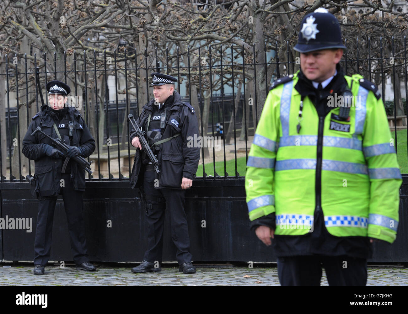 Armed police officers outside the Houses of Parliament in London, as ...