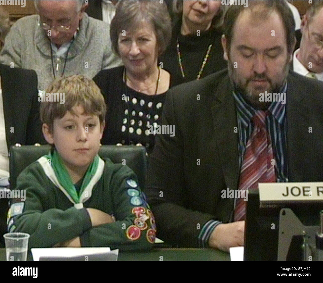Nine year old Alex Rukin with his dad Joe Rukin appear before HS2 Hybrid Bill Committee at the House of Commons as Alex petitions the committee of MPs investigating the case for the HS2 high-speed rail link between London, the Midlands and the North. Stock Photo