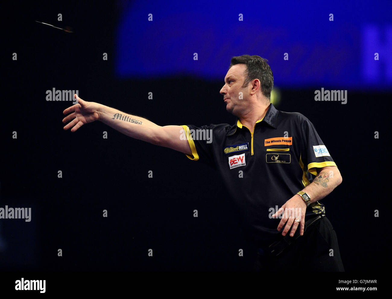 Darren Webster in his match against Dean Winstanley during the William Hill World Darts Championship at Alexandra Palace, London. Stock Photo