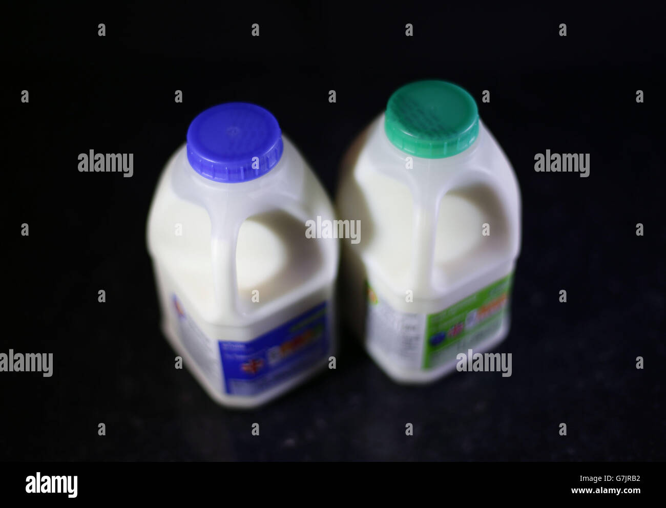 Pint of whole milk left pint of semi skimmed milk hires stock