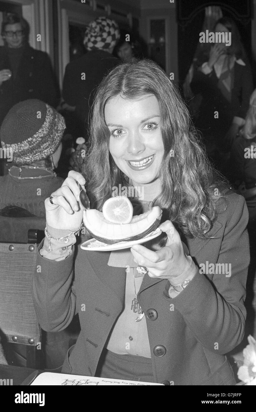 Miss World 1974 - Hampton Court, London. Miss UK Helen Morgan, 22, enjoys a melon dish at Hampton Court. Stock Photo
