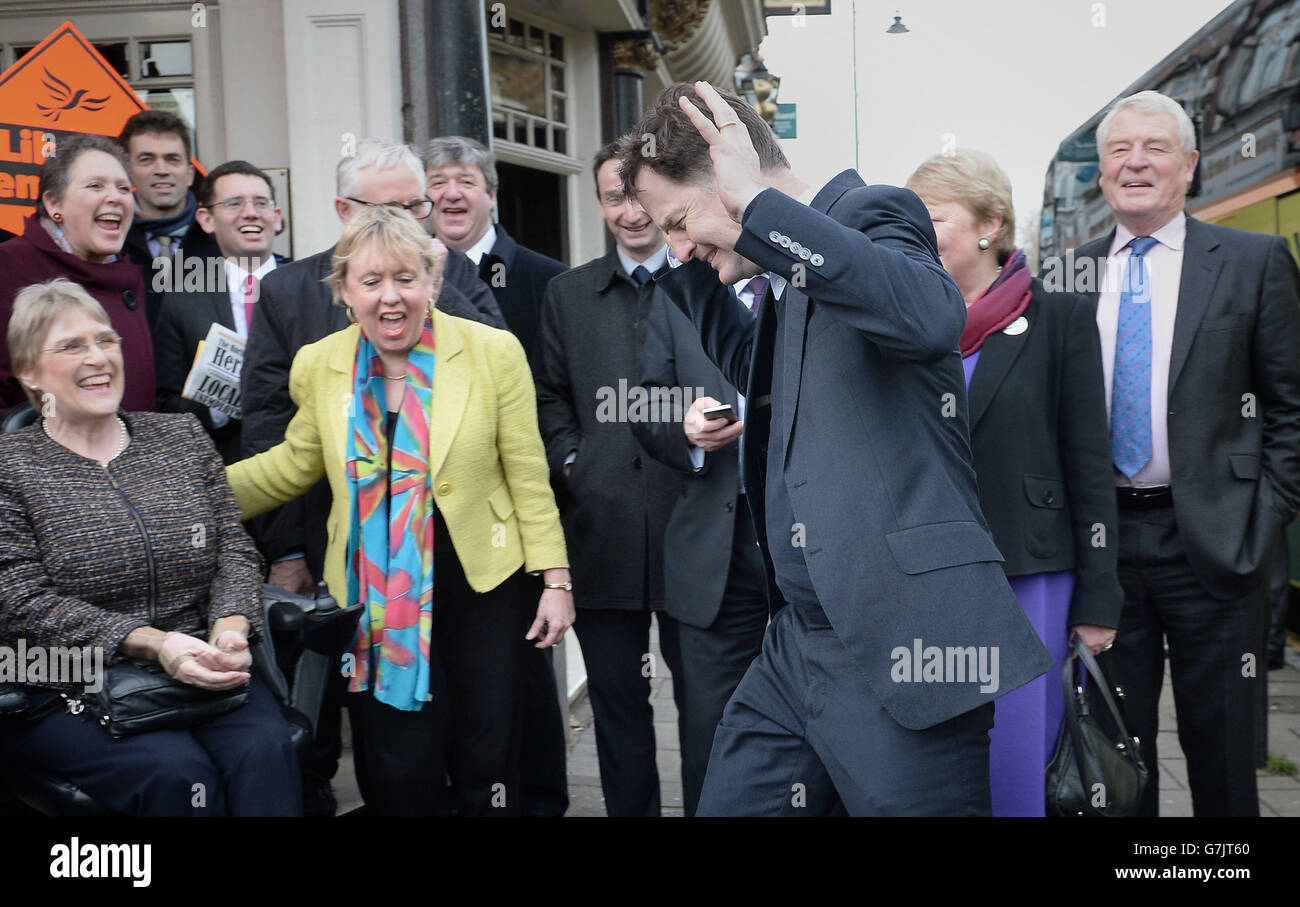 Deputy Prime Minister Nick Clegg reacts as party members sing happy