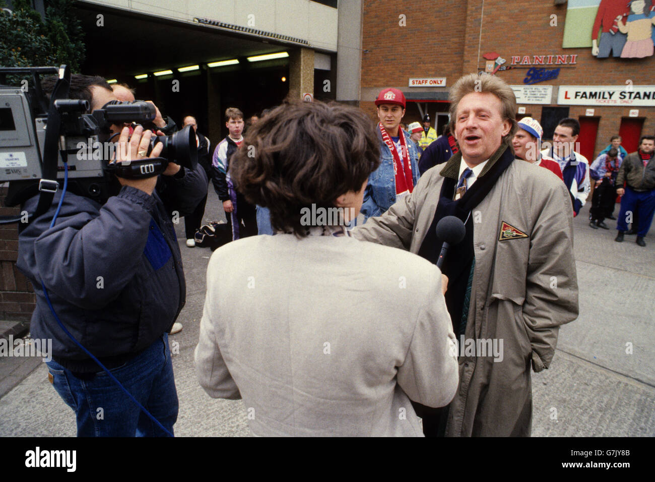 Soccer - Denis Law - Old Trafford. Manchester United legend Denis Law giving a TV interview outside Old Trafford. Stock Photo