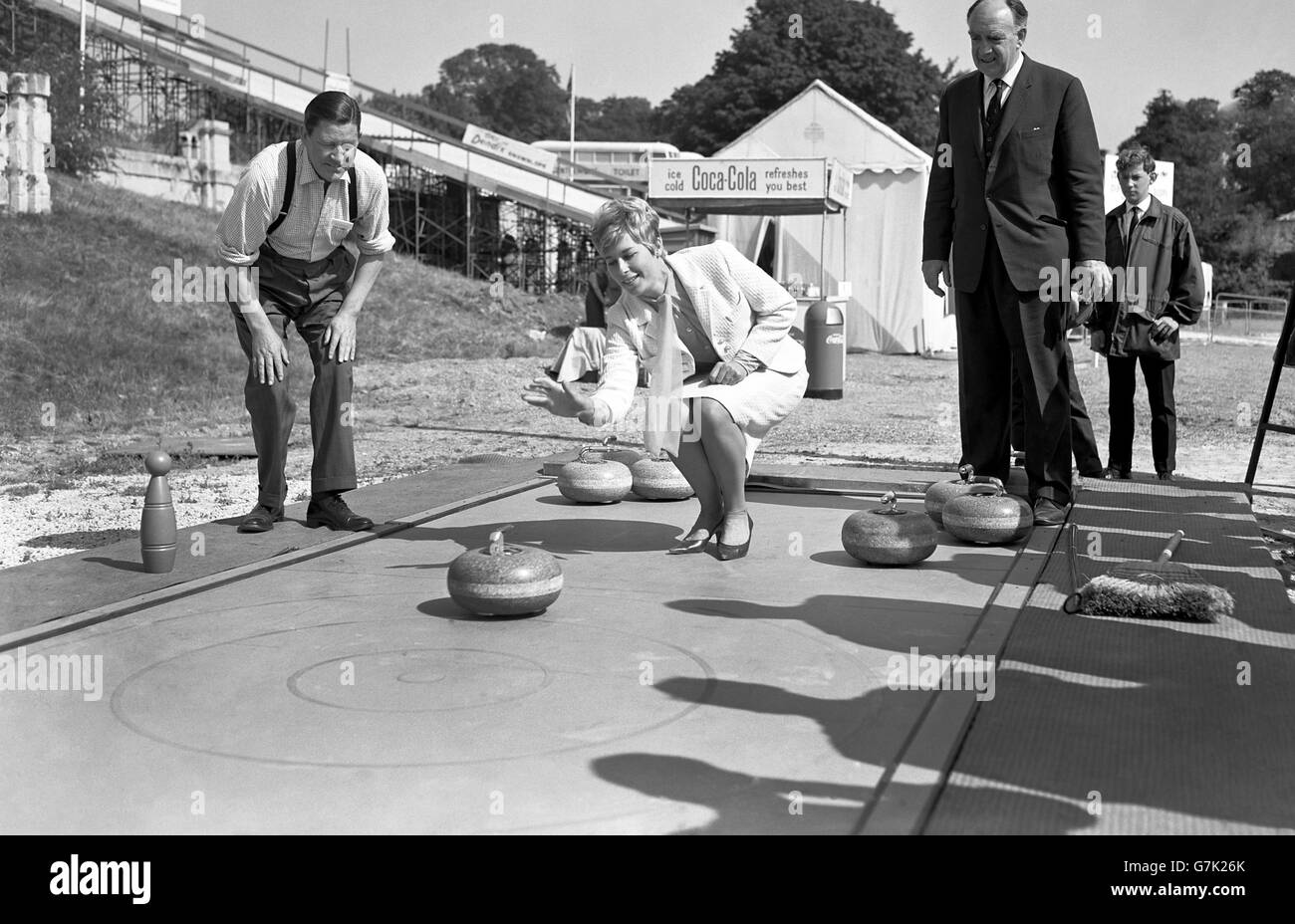 Mary Rand (Long Jump World Record holder) tries her hand at Curling on