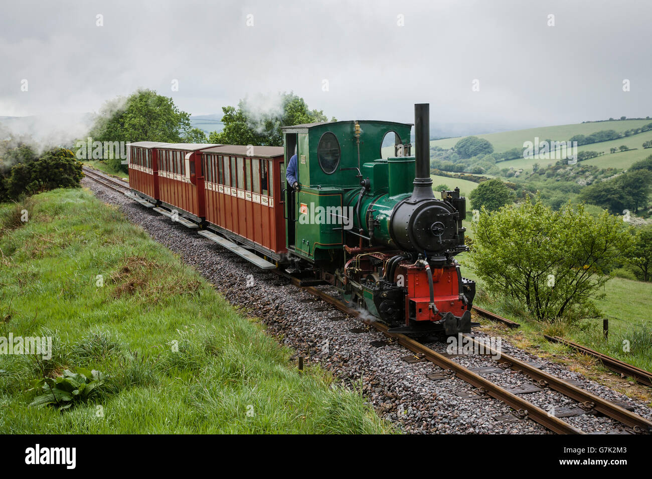 Train approaching Woody Bay station, Lynton and Barnstaple Railway, Parracombe, Exmoor, Devon,  England Stock Photo