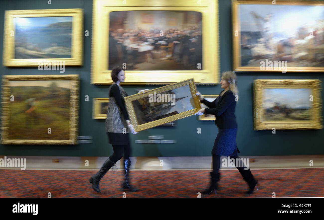 Guildhall Art Gallery Curators Julia Dudkiewicz And Katty Pearce Carry A Painting During The Guildhall Art Gallery S Re Launch Following A Re Hang For The First Time In 15 Years Guildhall Art Gallery London