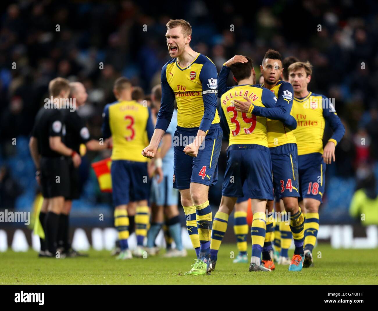 Soccer - Barclays Premier League - Manchester City v Arsenal - Etihad Stadium. Arsenal's Per Mertesacker celebrates after the final whistle during the Barclays Premier League match at the Etihad Stadium, Manchester. Stock Photo