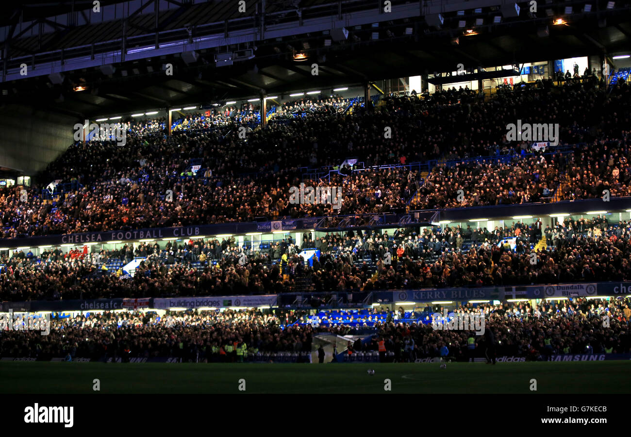 The lights are lowered as the players make their way out for the match before the Capital One Cup Semi Final, Second Leg match at Stamford Bridge, London. PRESS ASSOCIATION Photo. Picture date: Tuesday January 27, 2015. See PA story: SOCCER Chelsea. Photo credit should read: Nick Potts/PA Wire. No use with unofficial audio, video, data, fixtures or club/league Stock Photo