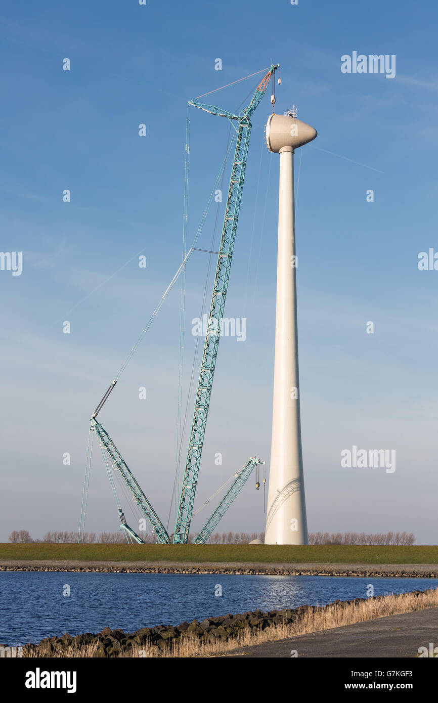 Dutch coast with construction site new wind turbine. The rotor house is ...