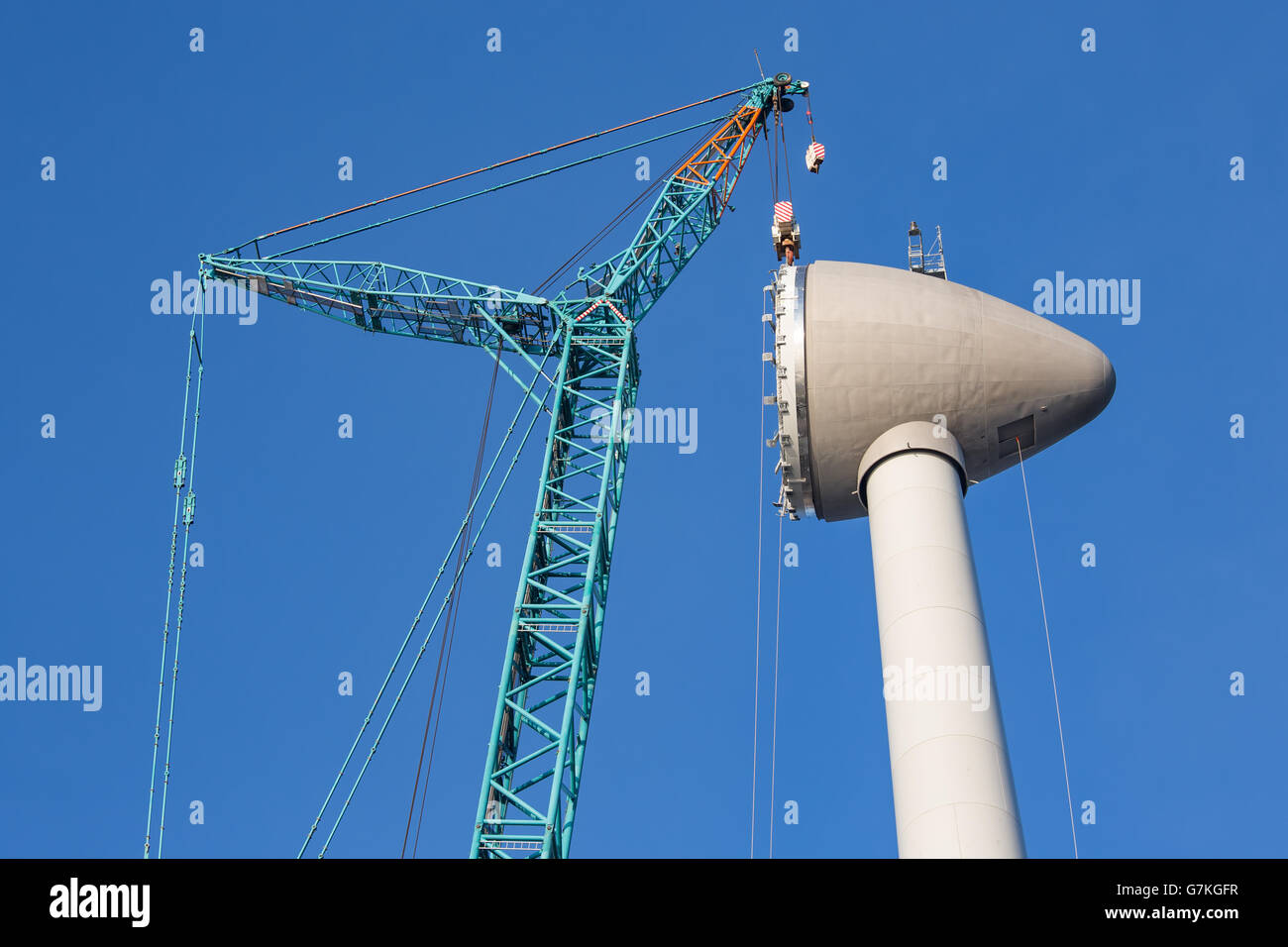 Construction site new wind turbine with hoisting of rotor house Stock ...