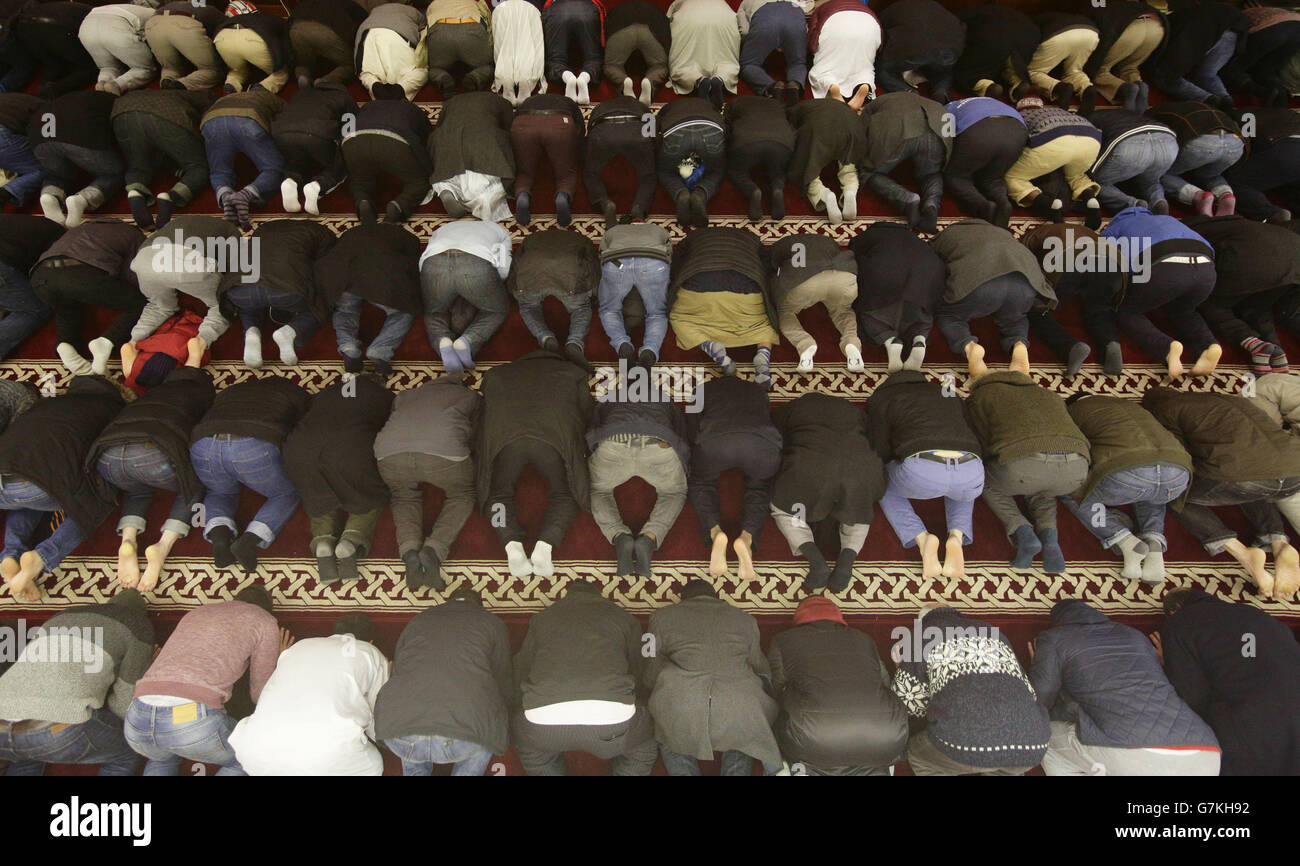 Worshippers observe sunset prayer (Maghrib) at Finsbury Park Mosque in north London, during a
