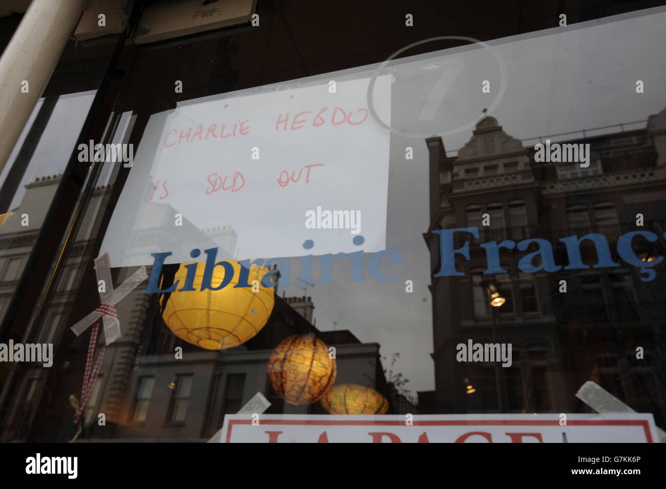 A sign in The French Bookshop of the Charlie Hebdo magazine which sold out. Stock Photo