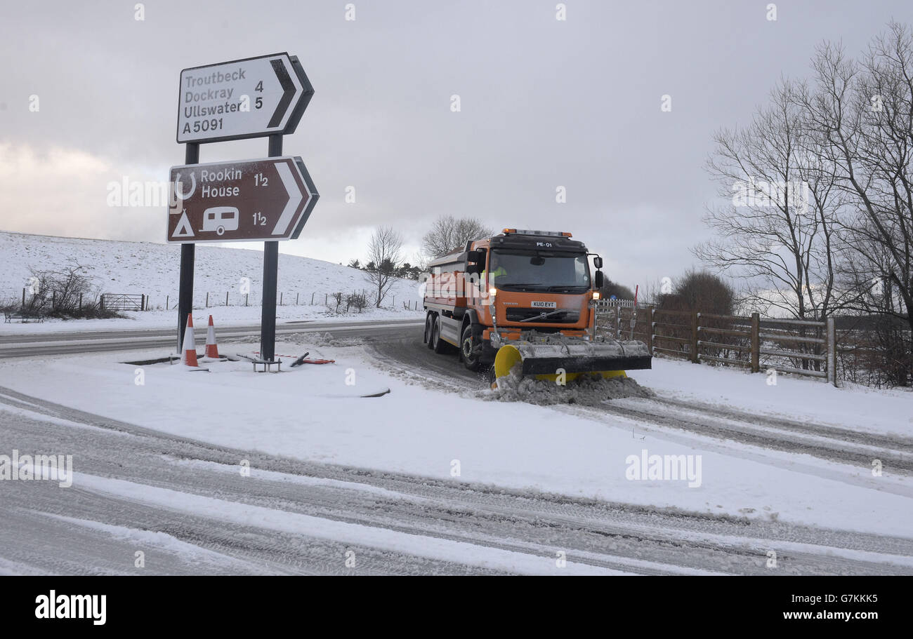 A snow plough in Troutbeck, Cumbria as temperatures will plunge below