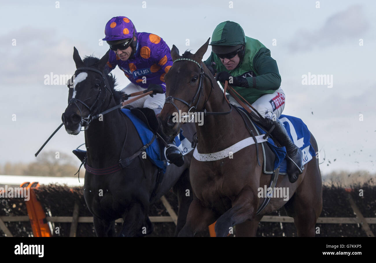 Top Riden Top Notch ridden by Barry Geraghty (right) jumps the last flight in ...