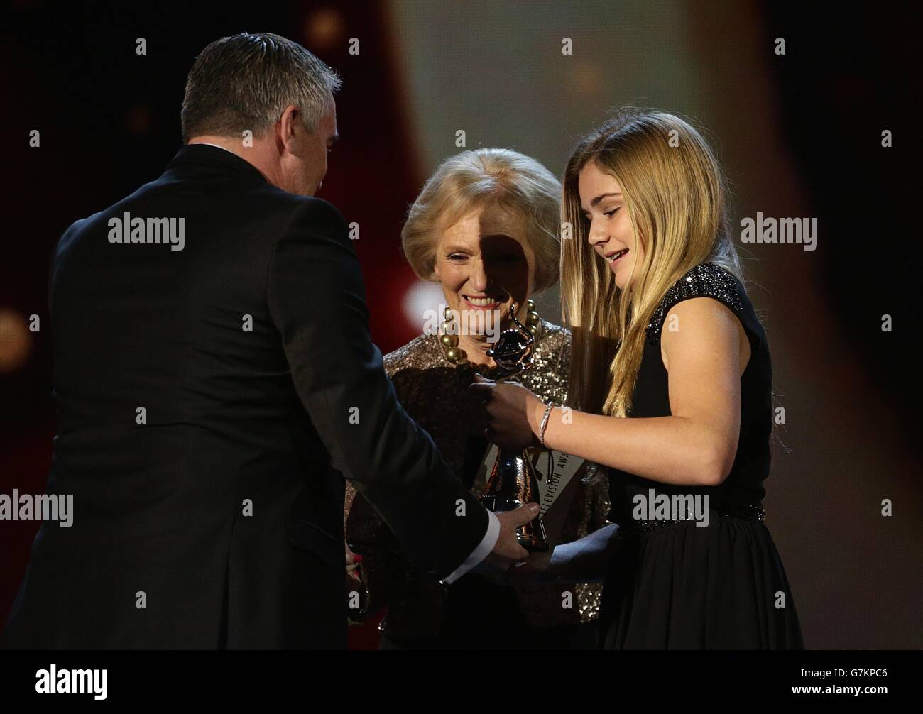 Matilda Ramsay presents Paul Hollywood and Mary Berry with the Best Factual Entertainment Award for The Great British Bake off during the 2015 National Television Awards at the O2 Arena, London. Stock Photo