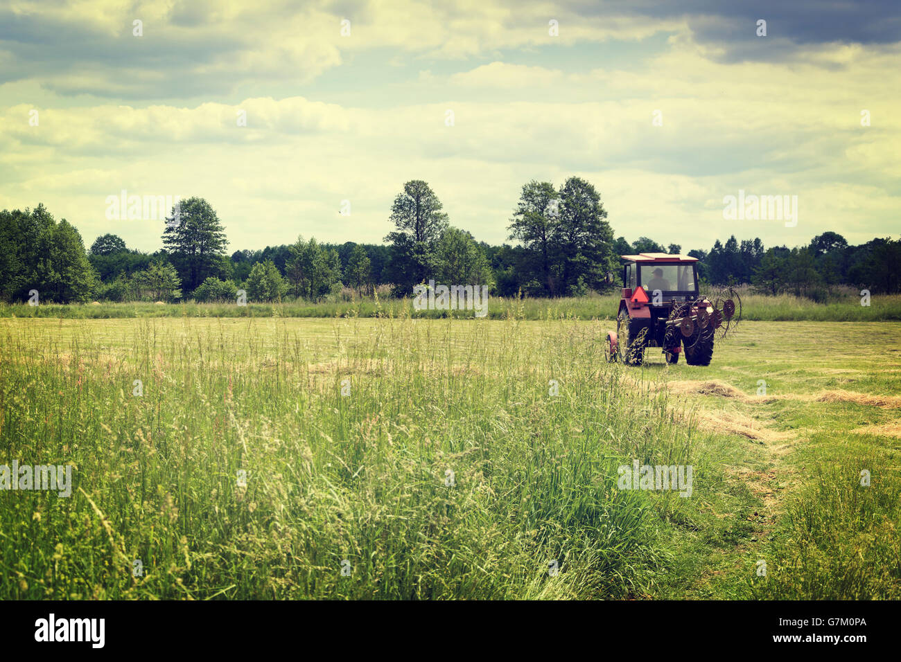 Red old tractor on land hi-res stock photography and images - Alamy