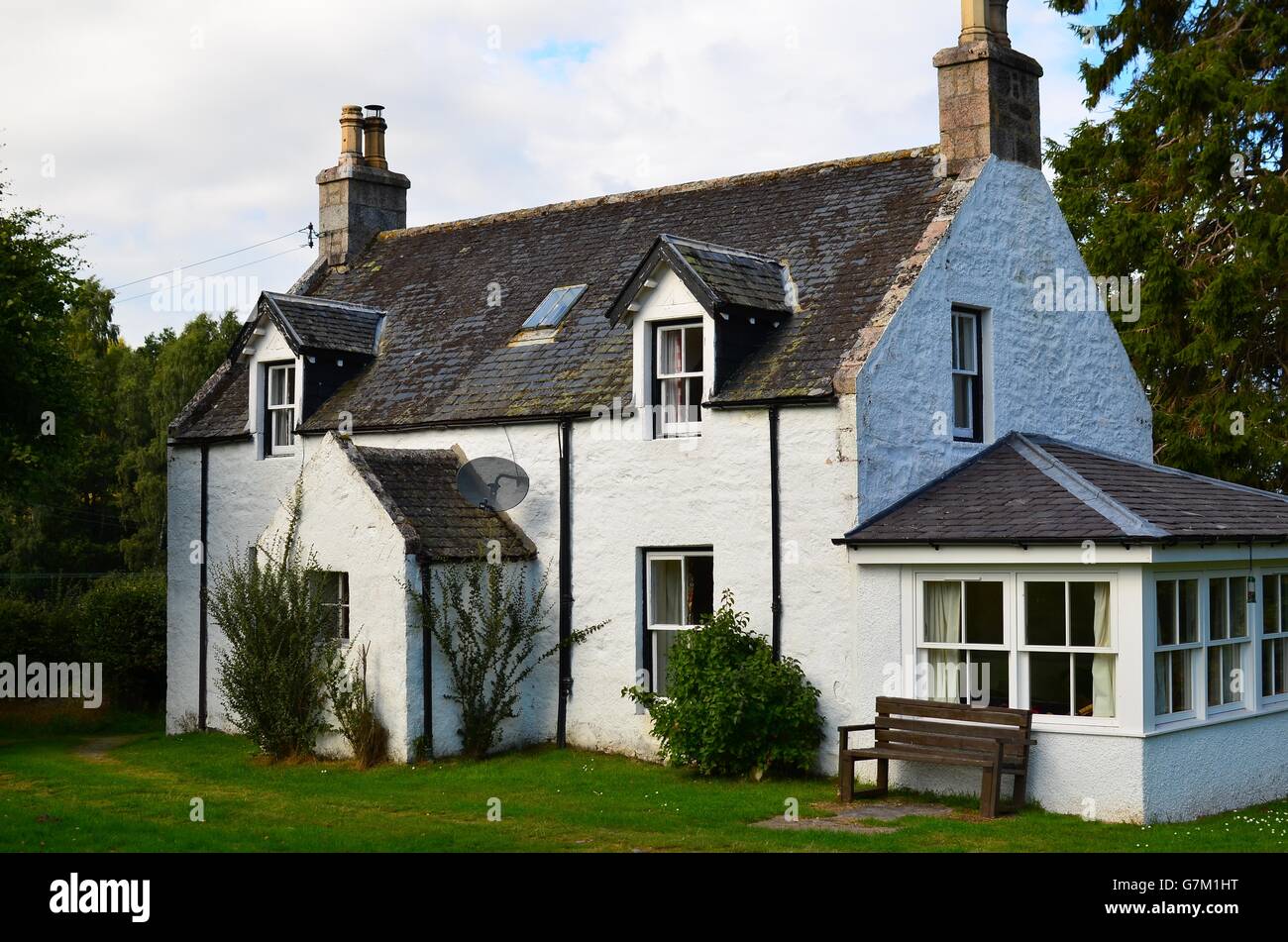 Typical Scottish Cottage With Weathered Slate Roof In The