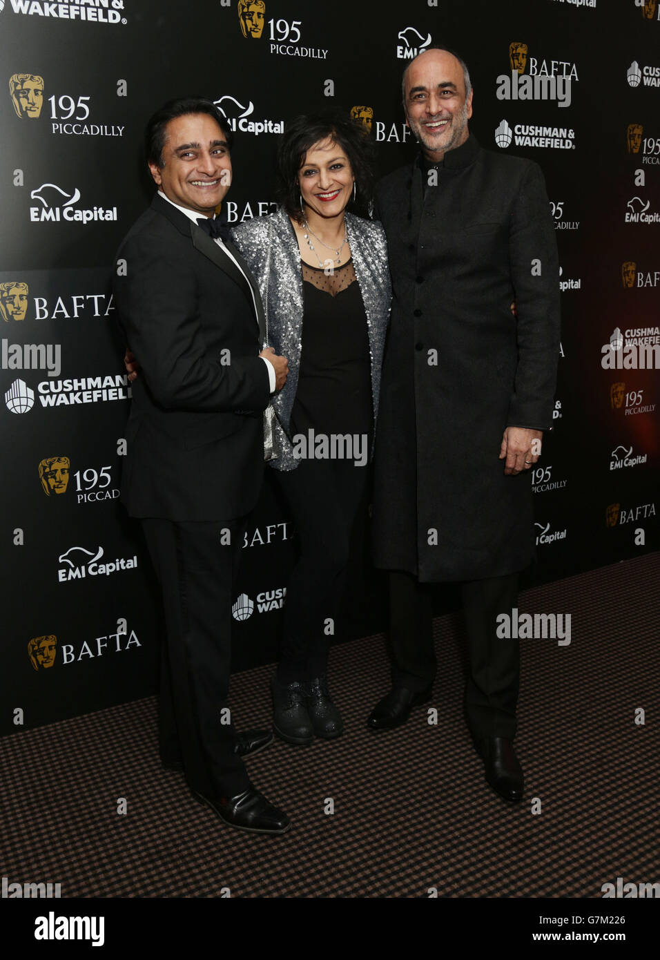 (Left to right) Sanjeev Bhaskar, Meera Syal and Art Malik attending the BAFTA Film Gala Dinner, in support of its 'Give Something Back' campaign at BAFTA in Piccadilly, London. Stock Photo