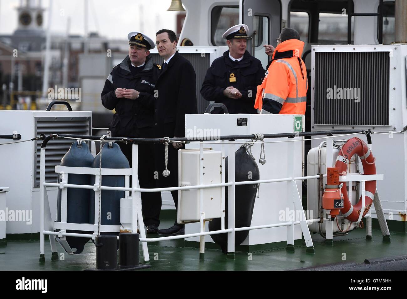 Chancellor George Osborne (centre) talks with HMNB Portsmouth base ...