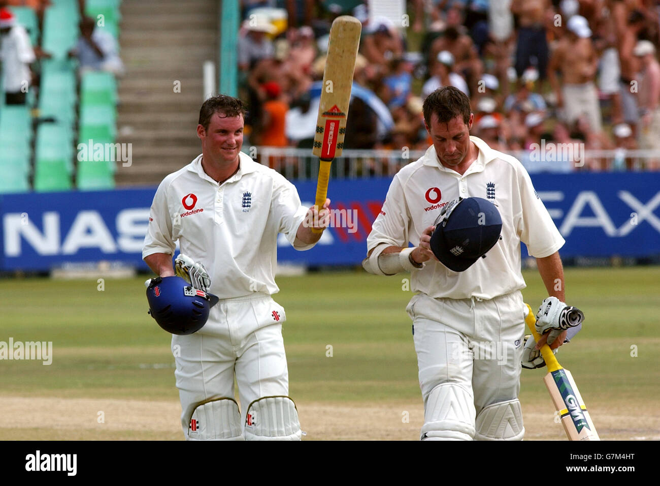England openers Andrew Strauss (left) and Marcus Trescothick leave the