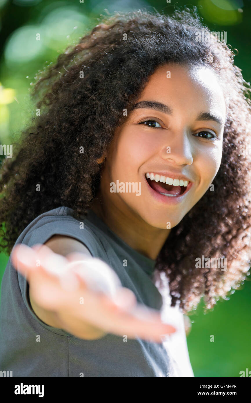 Outdoor Portrait Of Beautiful Happy Mixed Race African American Girl Teenager Female Young Woman