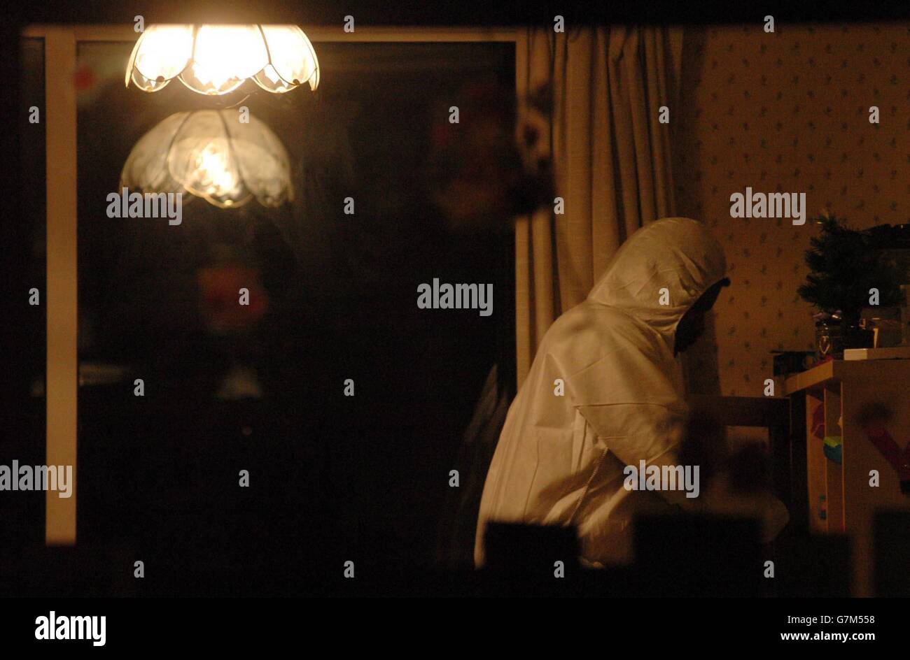 Crime scene investigator searches inside house in mere close hires