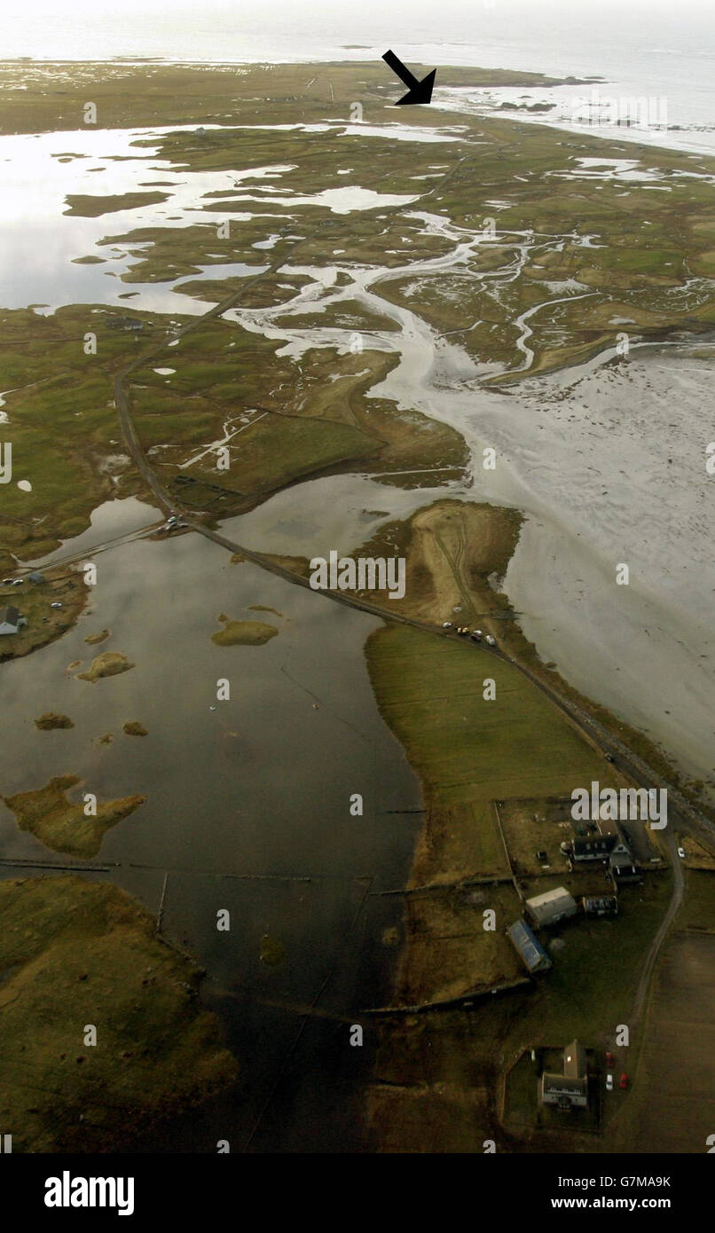 Aerial shot of MacPherson family home (marked with arrow) and the house (bottom) where they were thought to be heading as they were swept to their deaths in the storm-battered Western Isles. Stock Photo