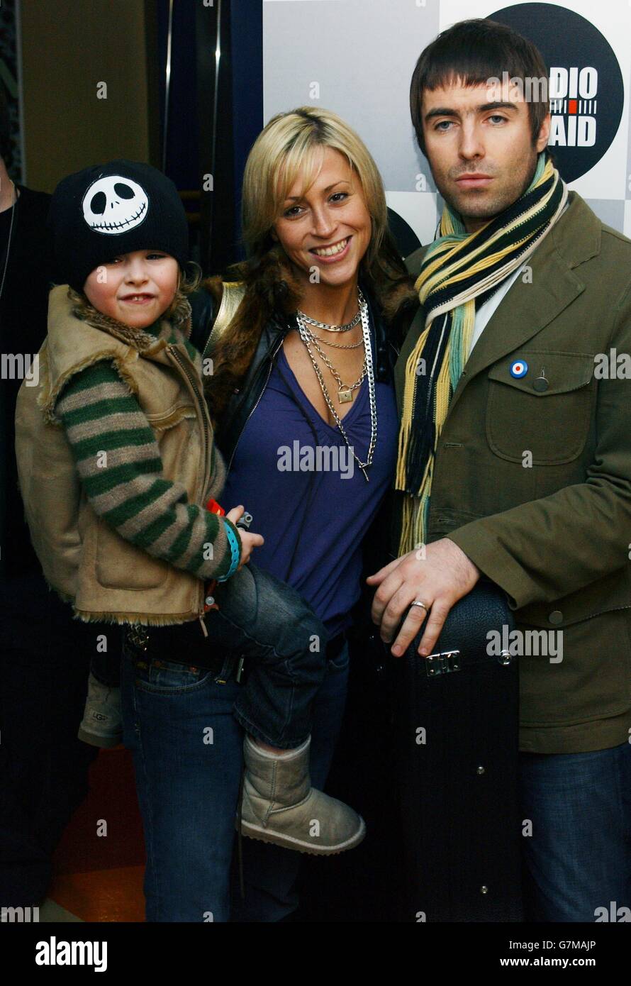 Liam Gallagher His Partner Nicole Appleton And Their Son Gene Arriving To Take Part In A 268 Station 12 Hour Commercial Radio Show To Raise Money For Tsunami Victims Stock Photo Alamy