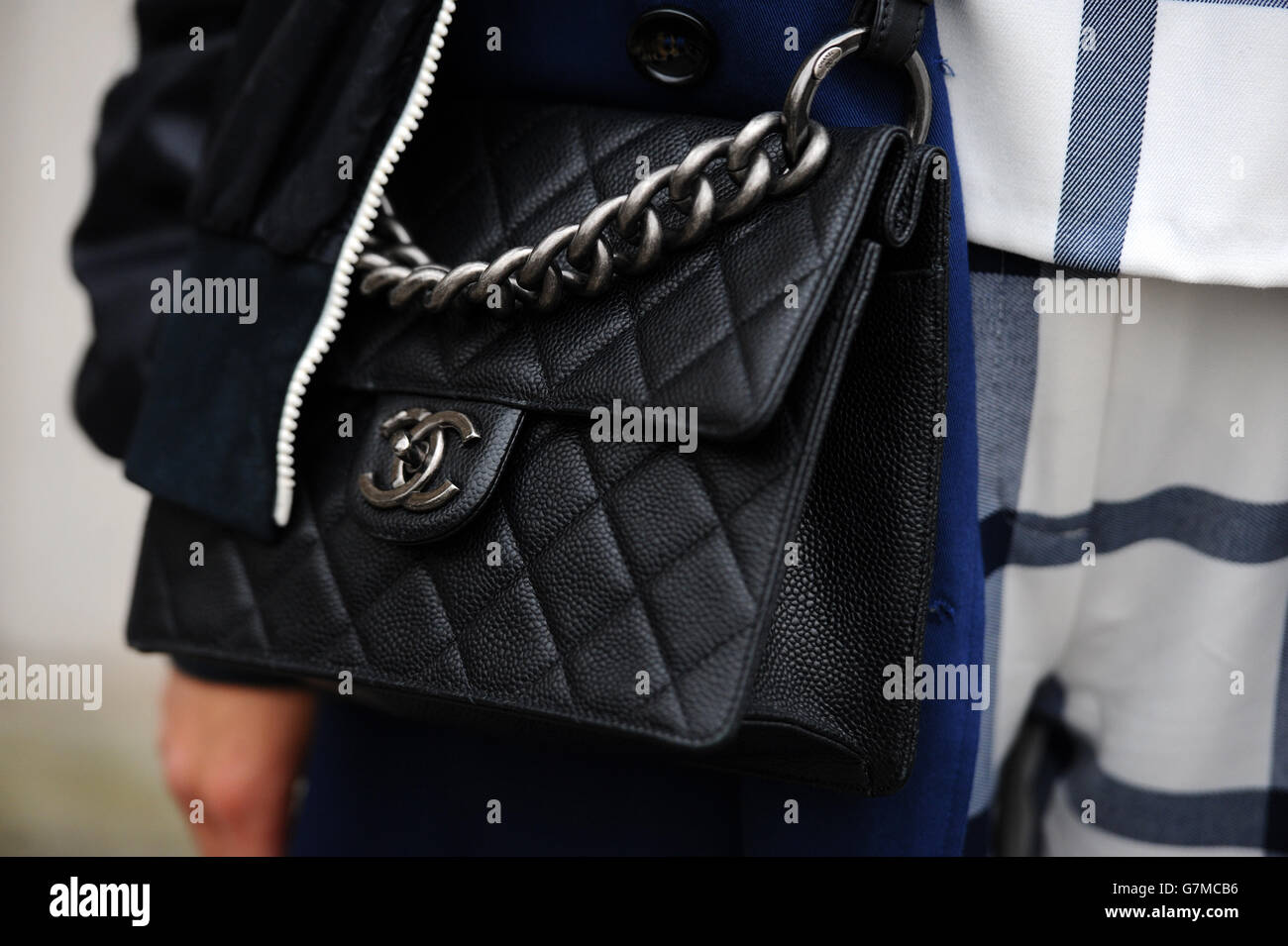 Women with Black Leather Chanel Bags before Antonio Marras Fashion Show, Milan  Fashion Week Street Style on Editorial Photography - Image of marras,  dress: 194564517