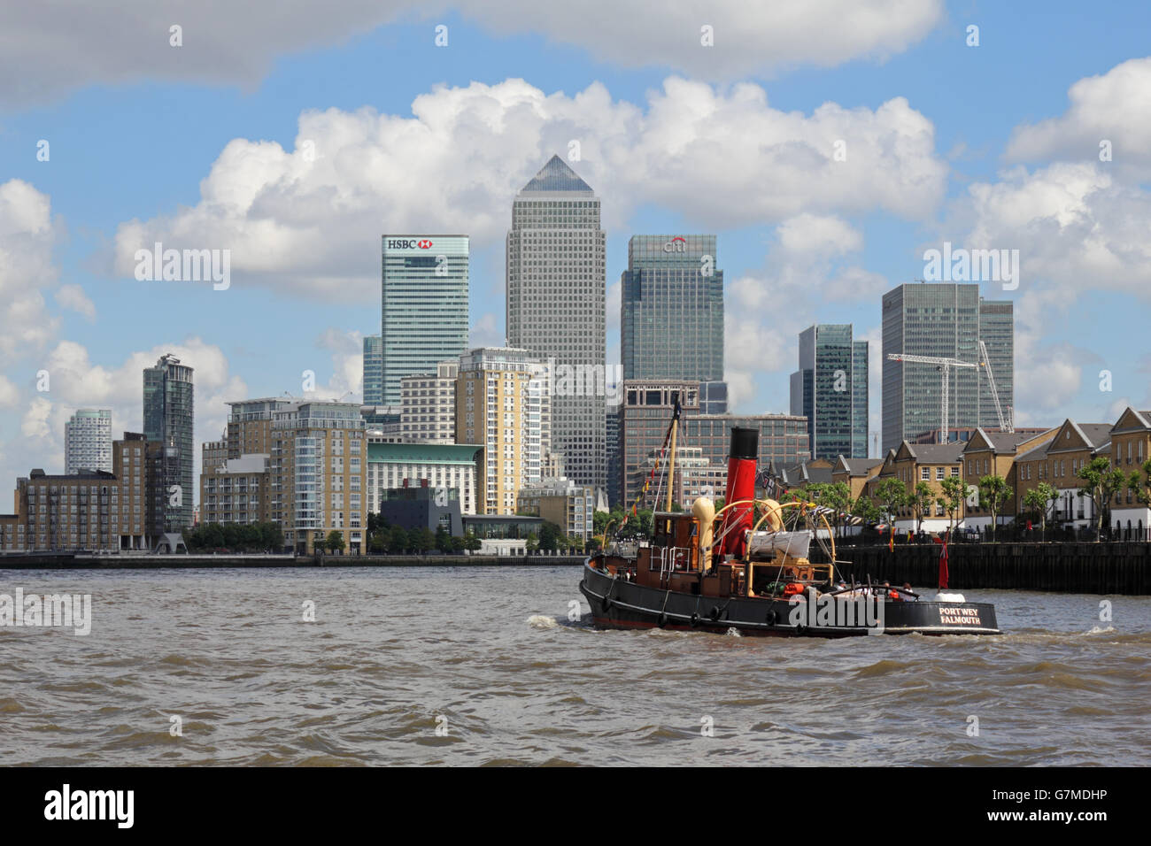 Canary Wharf in Docklands from the River Thames, with the Portwey coal