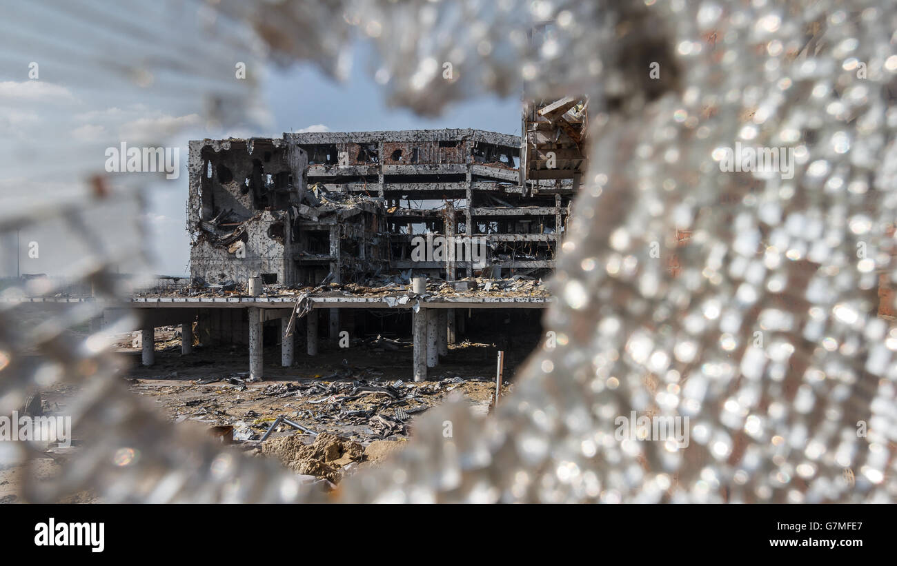 Wide angle view of airport ruins through glass Stock Photo