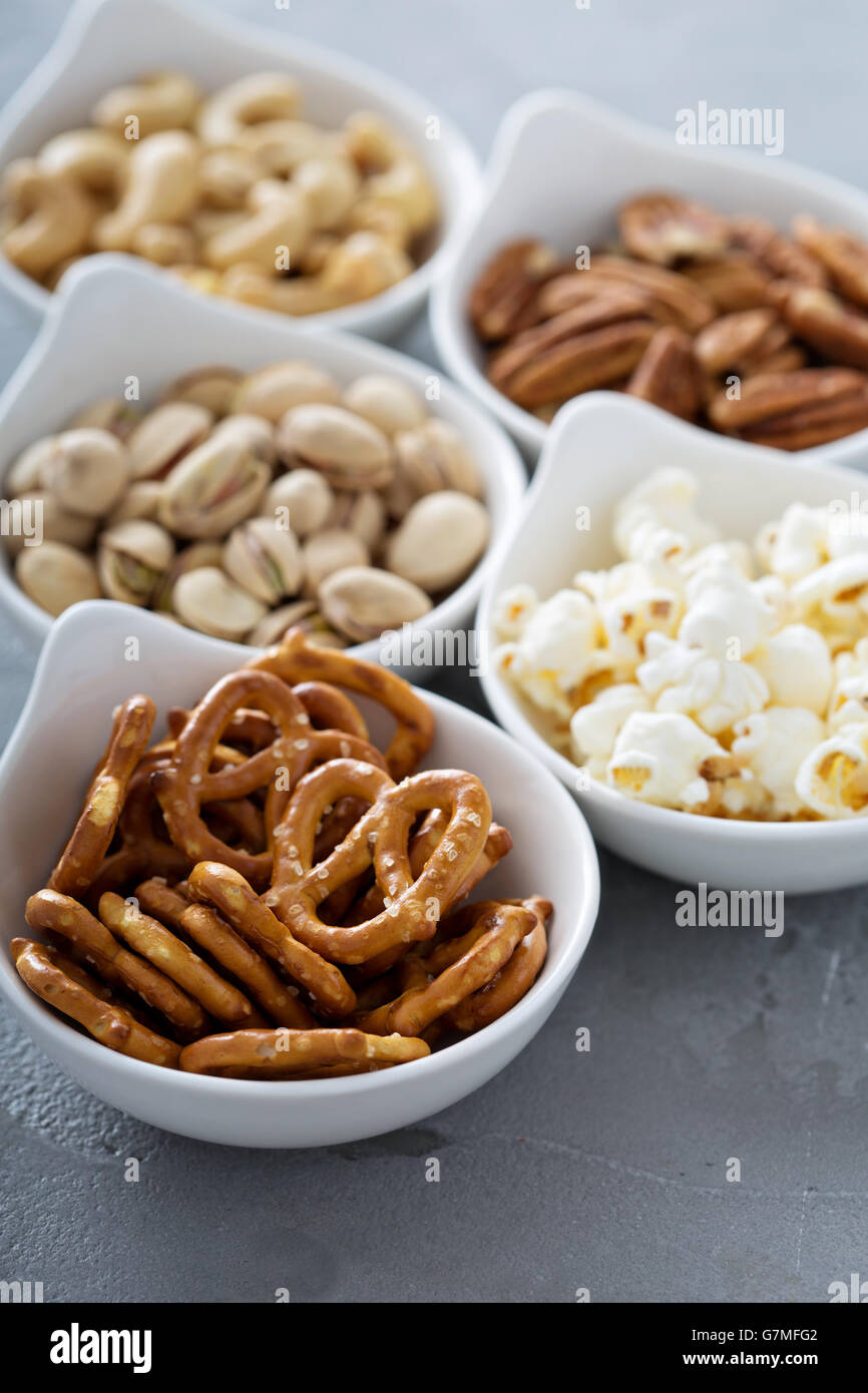 Variety of healthy snacks in white bowls Stock Photo Alamy
