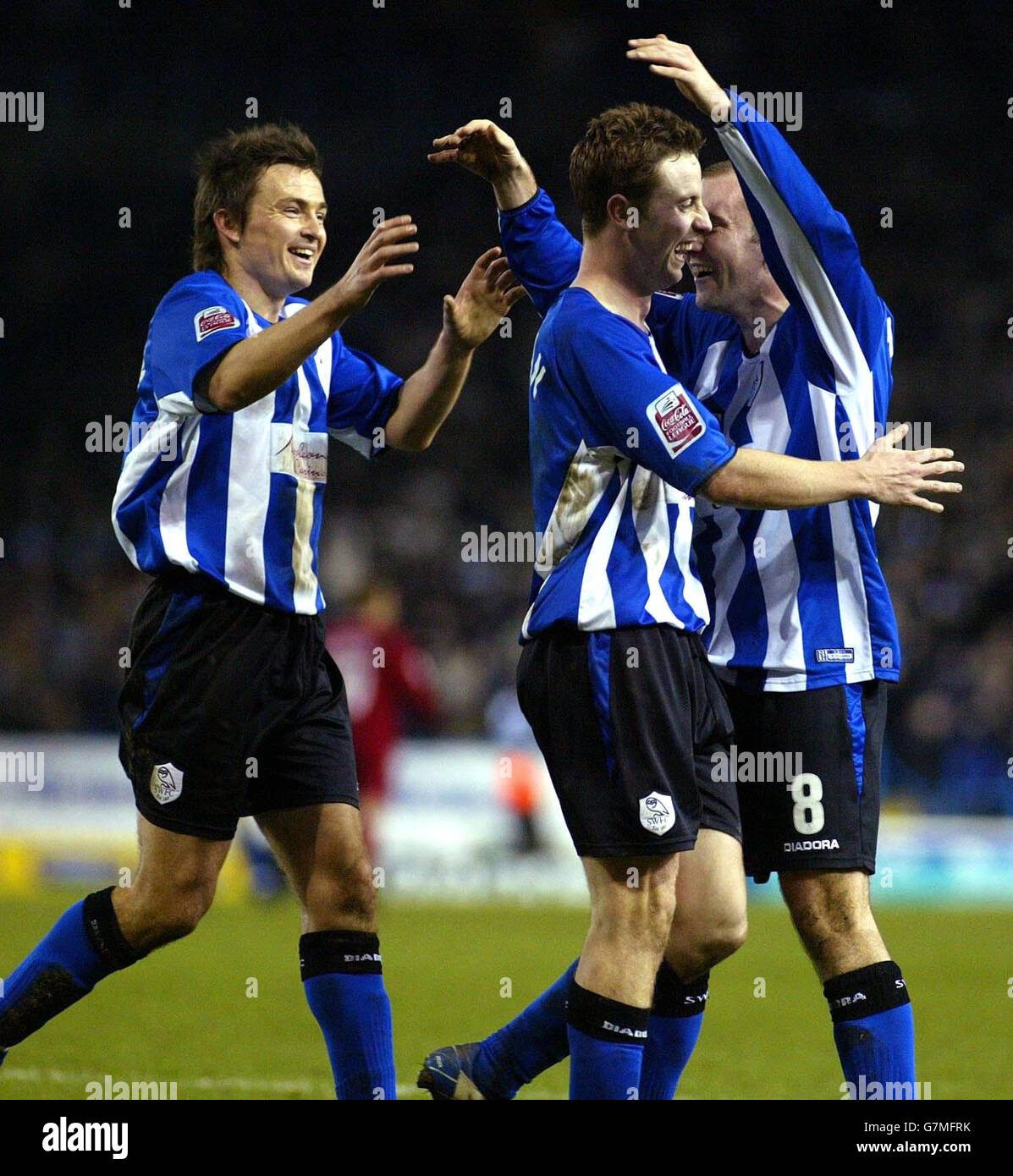 Sheffield Wednesday's Steve MacLean (centre) celebrates witht team-mates Paul Heckingbottom and Matthew Hamshaw Stock Photo