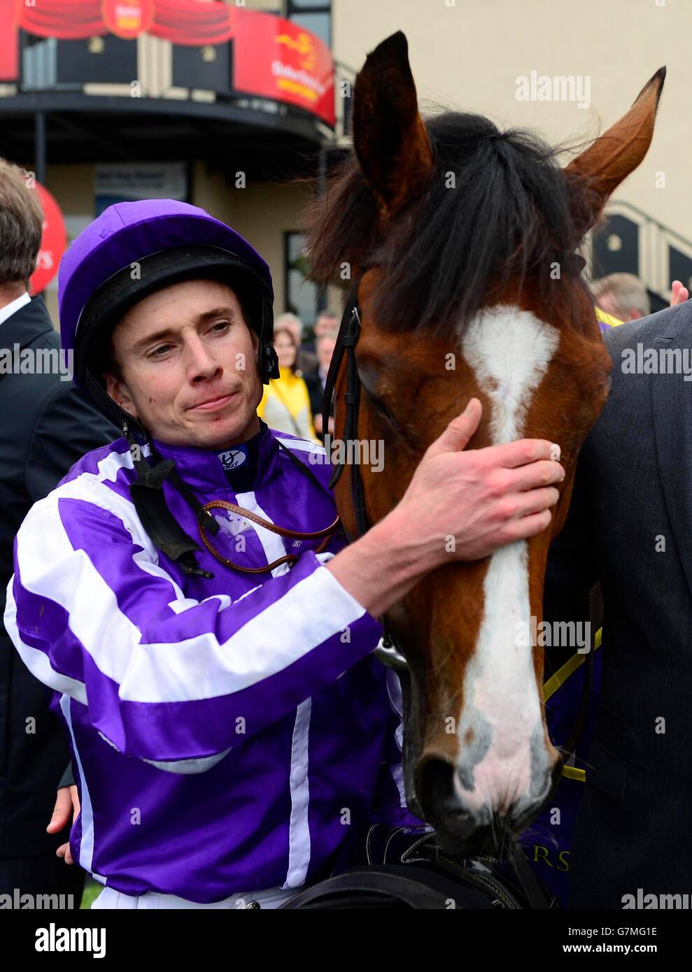 Minding and jockey Ryan Moore celebrate winning the Sea The Stars Pretty Polly Stakes during day three of the Dubai Duty Free Irish Derby Festival at Curragh Racecourse, Co. Kildare, Ireland. Stock Photo