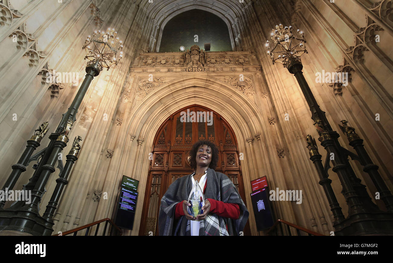 Model Waris Dirie in Westminster Hall at the Houses of Parliament, in London, with the 2014 Prize for Freedom for her global work in promoting awareness and fighting against female genital mutilation. Stock Photo
