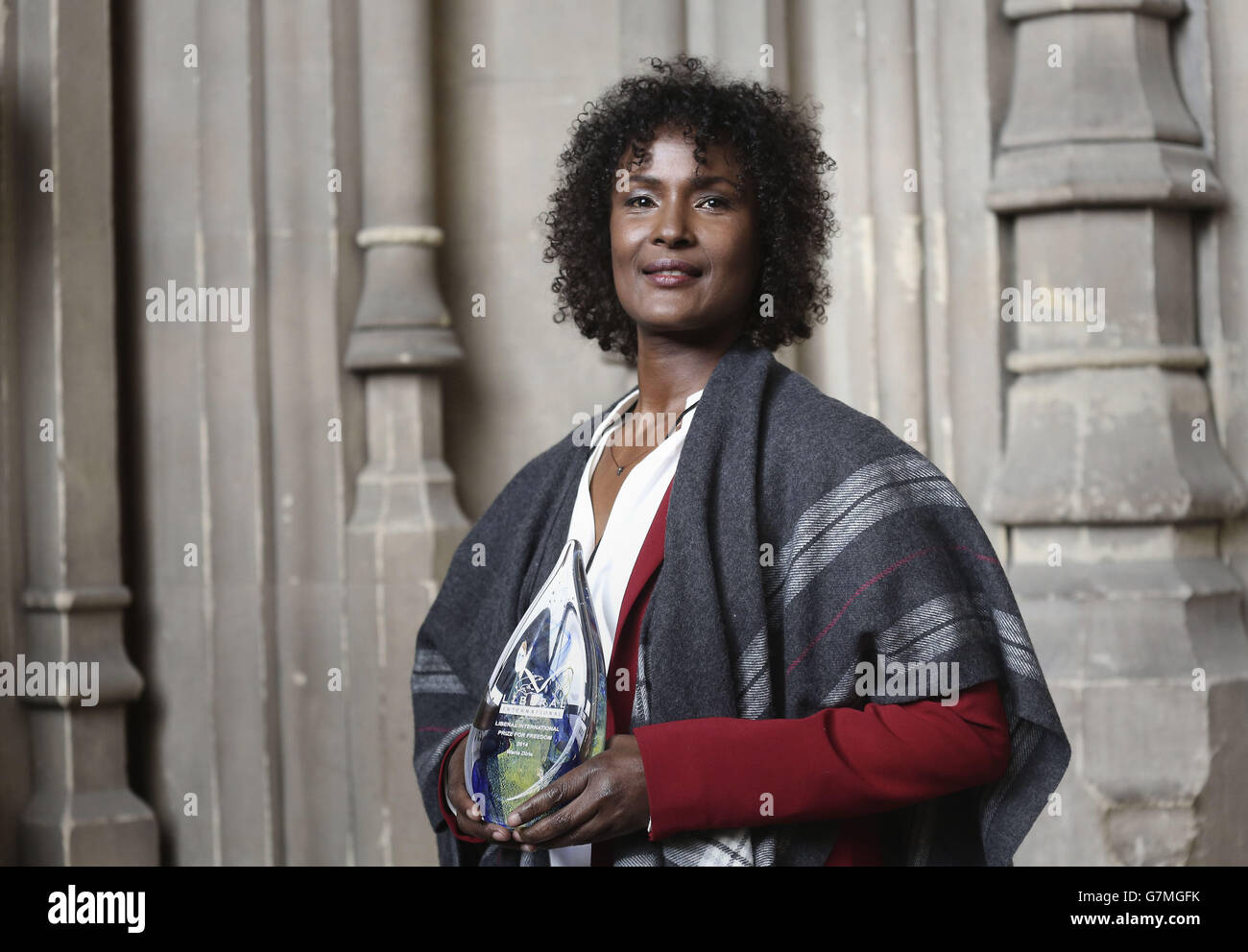 Model Waris Dirie in Westminster Hall at the Houses of Parliament, in London, with the 2014 Prize for Freedom for her global work in promoting awareness and fighting against female genital mutilation. Stock Photo