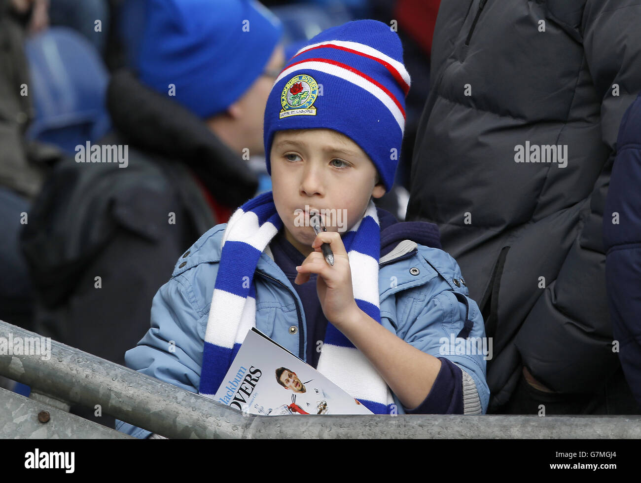 A young Blackburn Rovers fan waits to get an autograph Stock Photo - Alamy