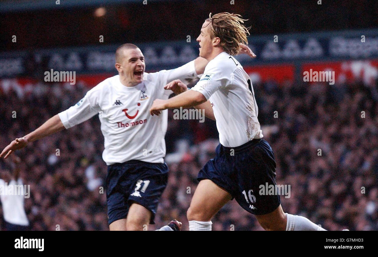 Tottenham Hotspur's Reto Ziegler (right) is congratulated by team-mate Dean Marney after scoring a goal against Everton. Stock Photo